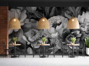 Monochrome floral arrangement featuring peonies and intricate textures||