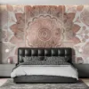 Elegant rose gold floral mandala design on a white background||