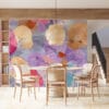 Abstract mural of colorful flower shapes in pink