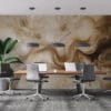 Abstract art with fluid patterns in warm beige and brown tones.