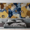 Abstract floral design with geometric shapes in yellow and blue.||