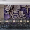 Intricate floral paper cut design in shades of purple and cream.