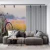 Serene outdoor scene with a pink bicycle and a field of wildflowers||