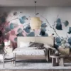 Delicate watercolor floral mural with blue and gray leaves on a pink background.||