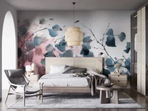 Delicate watercolor floral mural with blue and gray leaves on a pink background.