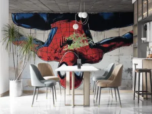 Spider-Man hanging upside down in vibrant street art.||