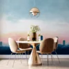Urban skyline under a soft blue sunrise with colorful gradient sky.||
