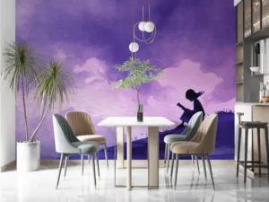 Silhouette of a person reading in a serene landscape with dreamy colors.||