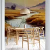 Tranquil landscape of a winding river surrounded by golden fields and rolling hills.||