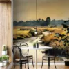 A serene natural landscape with a winding stream surrounded by grassy areas.||