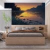 Serene riverbank scene at sunset with warm colors