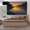 Serene riverbank scene at sunset with warm colors||