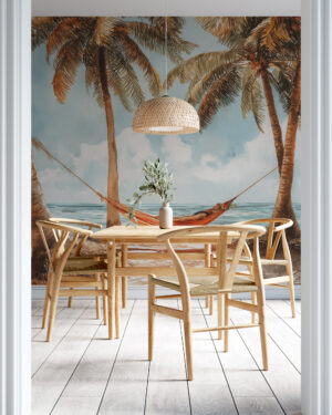 Hammock between palm trees on a sandy beach