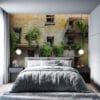Urban setting with balconies adorned with lush greenery