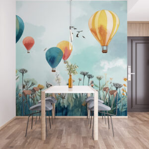Hot air balloons in a blue sky over a field of flowers