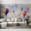 Hot air balloons in a serene landscape with a pastel sky